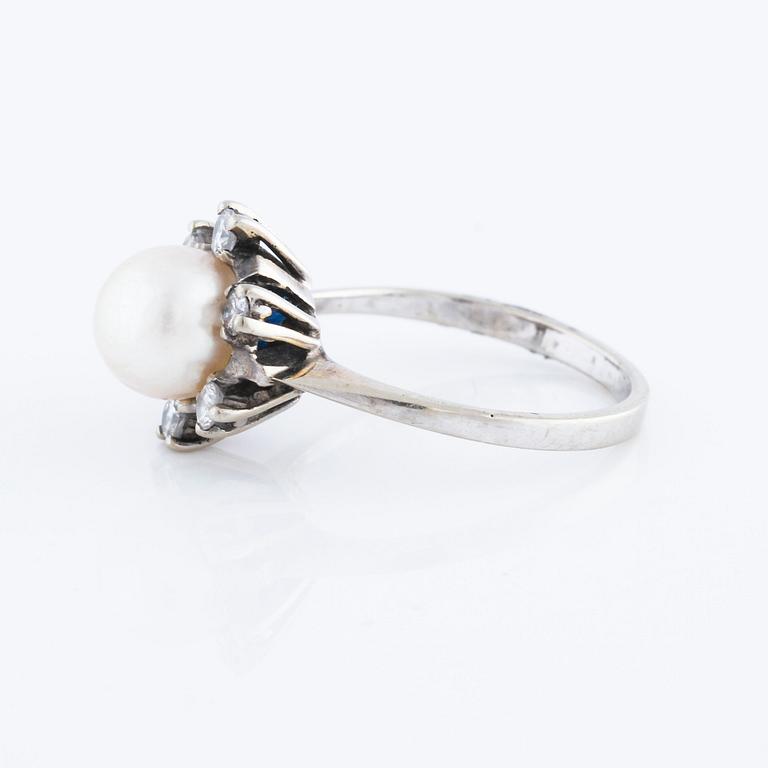 A cultured pearl and brilliant cut diamond ring.