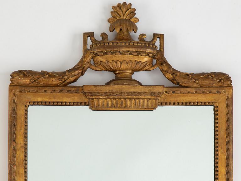 A Gustavian mirror, late 18th century.