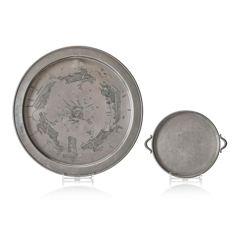 Firma Svenskt Tenn, a set of two pewter trays, Stockholm, 1930 and 1927.