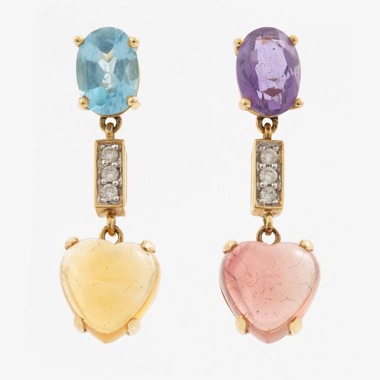 A pair of earrings in 18K gold with coloured gemstones and round brilliant-cut diamonds.