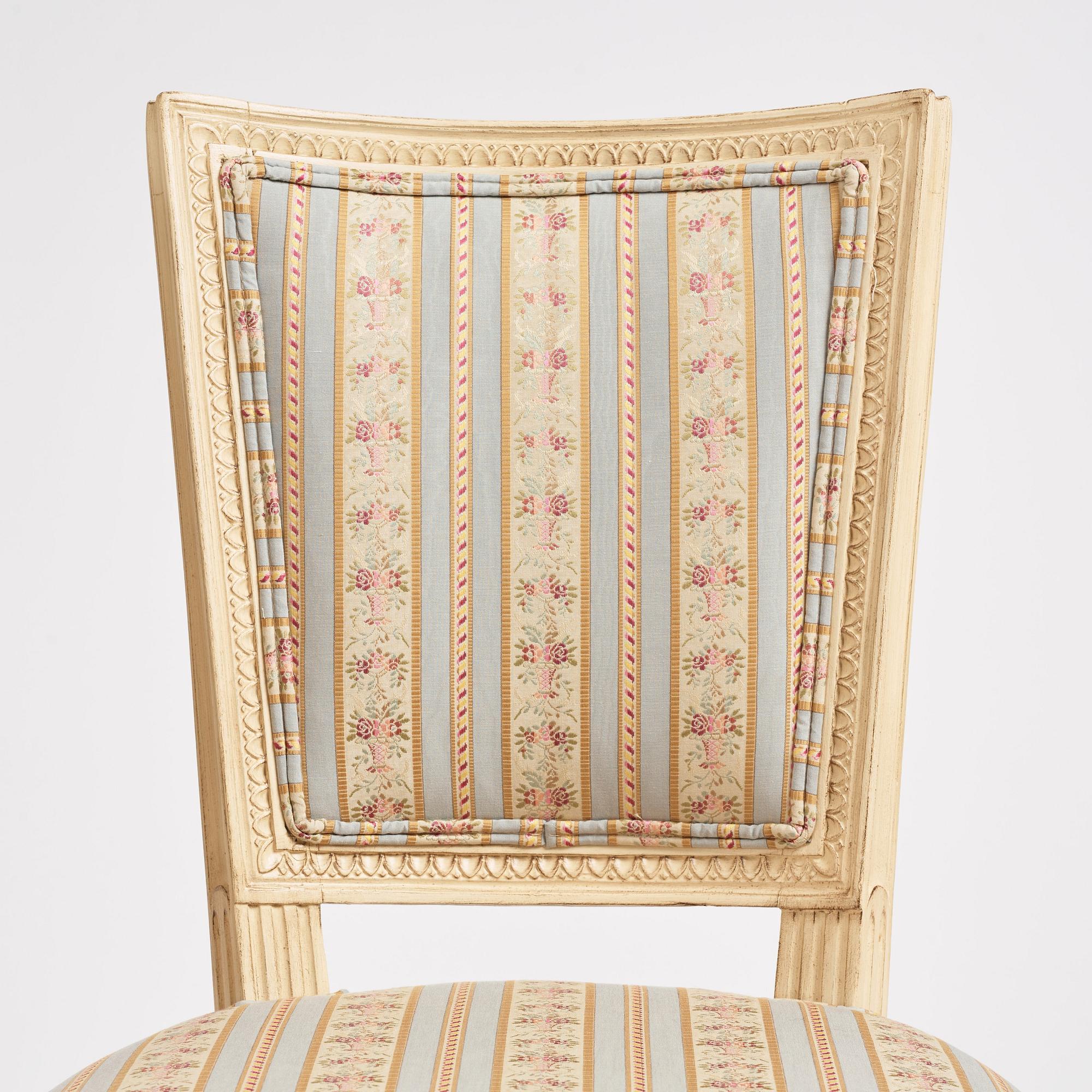 A set of nine Gustavian chairs by A Hellman (master in Stockholm 1761-94) and E Ståhl (master in Stockholm 1794-1820).