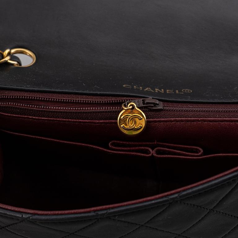 Chanel, a quilted leather 'Flap' bag, 1989-91.