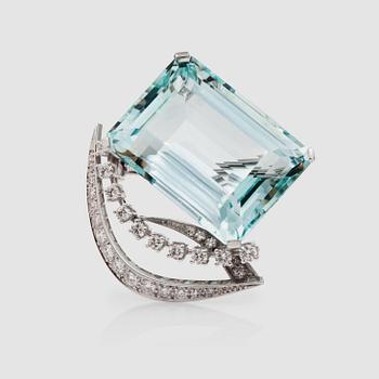 58. A aquamarine, circa 31.00 cts, and diamond, total carat weight circa 0.60 ct, brooch.