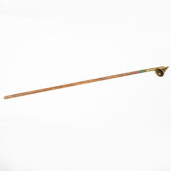 A 19th century brass candle snuffer.