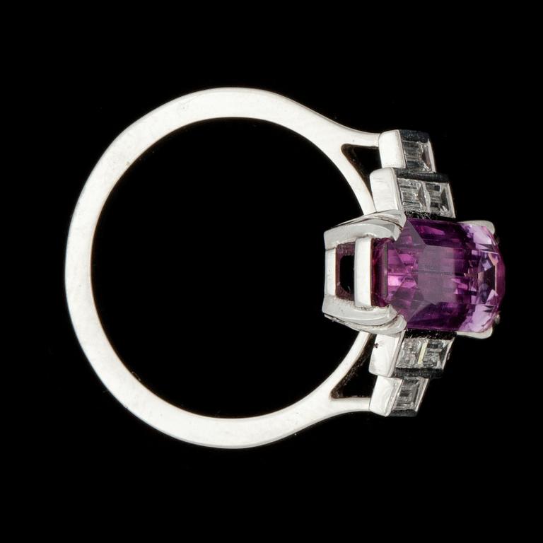 A pink topaz, 4.64 cts and baguette-cut diamond, total carat weight 0.32 ct, ring.