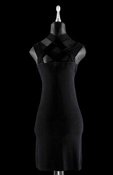1501. A black tight strech dress by Givenchy.