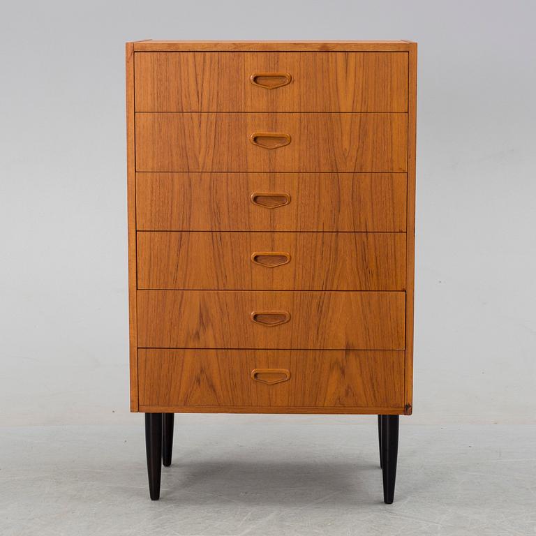 A mid 20th century teak chest of drawers.