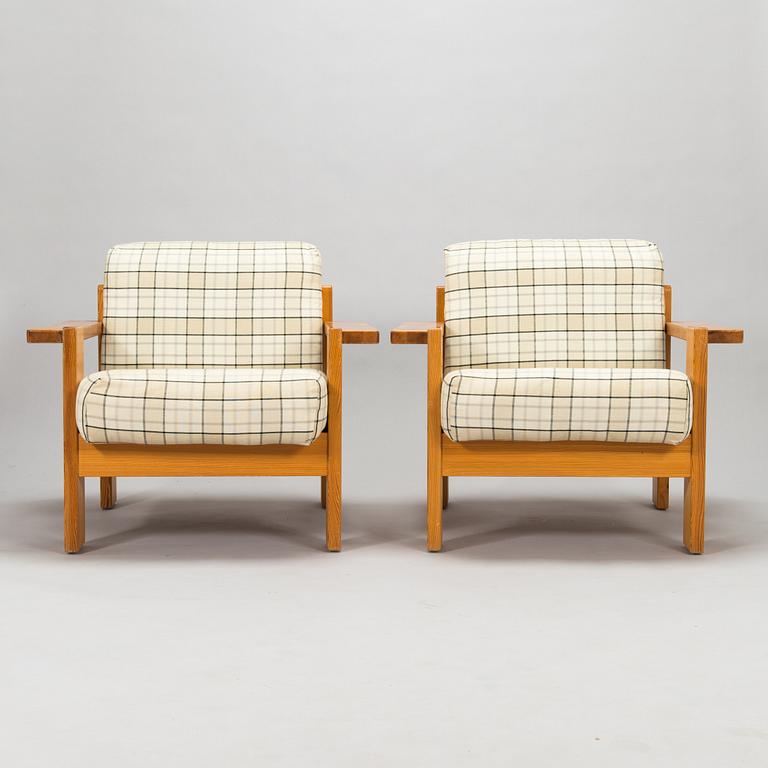 A pair of 1970's armchairs.