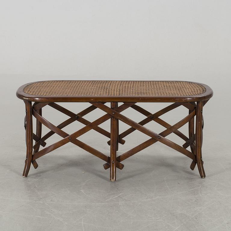 A wooden sofa, a table and four chairs, later part of the 20th century.
