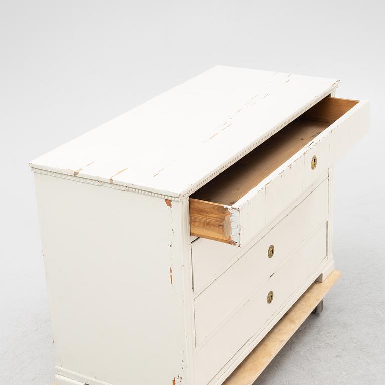 A painted chest of drawers, 19th Century.