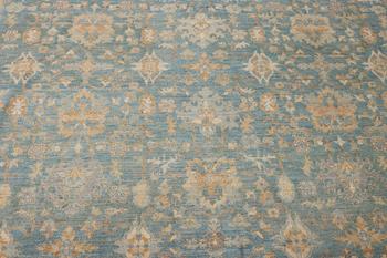 An Ushak carpet, c. 292 x 241 cm.