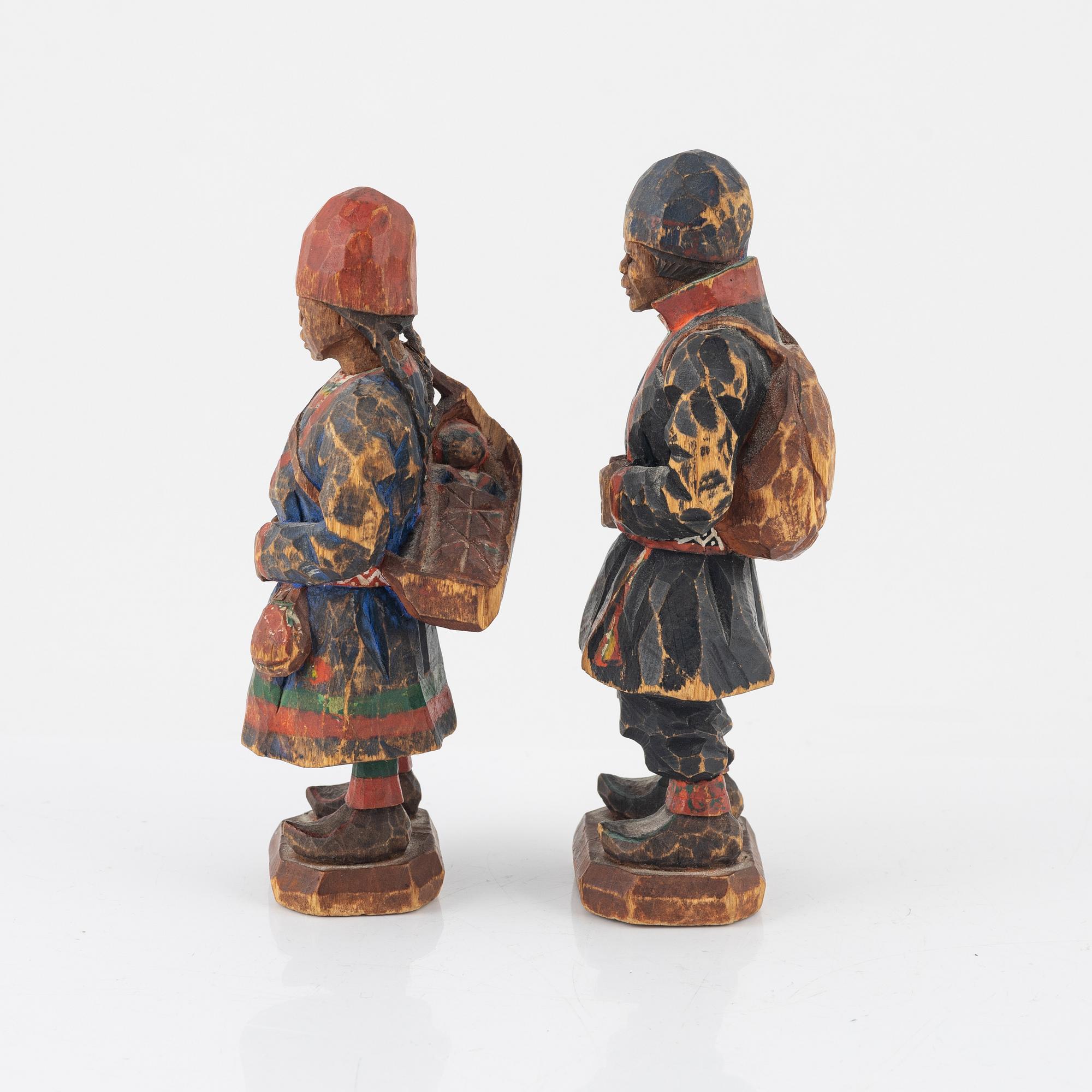 Torborg Lindberg-Karlsson, a pair of figurines, carved and painted wood, signed TL.
