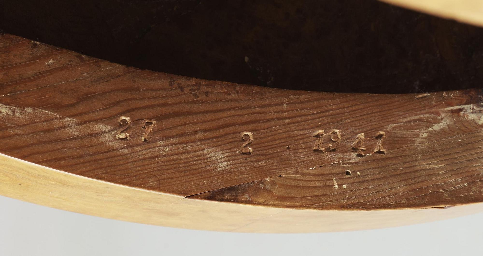 An Erik Johansson burr wood and blacquered sofa table,
Reiners Möbelfabrik, Sweden 1941.