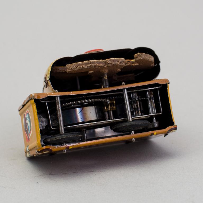 A tinplate Fritz Voith man with suitcase, Germany, 1950s.