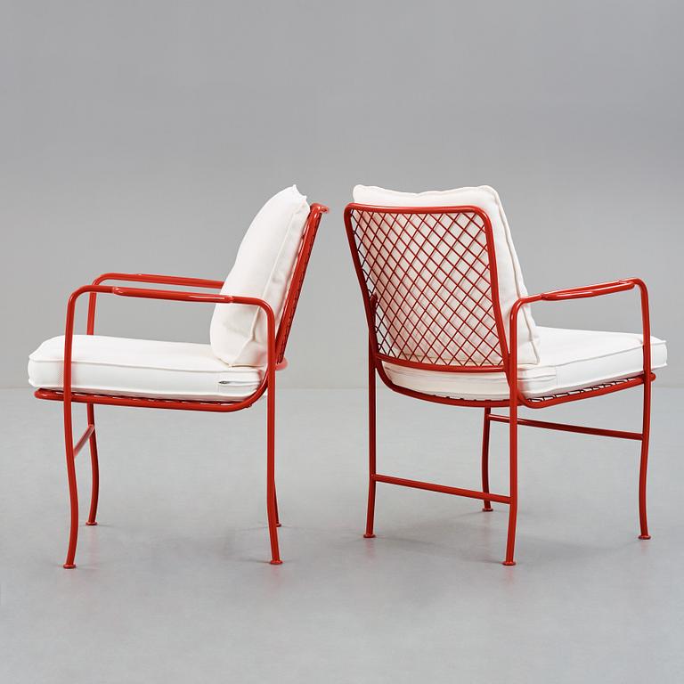 JOSEF FRANK, a set of four steel garden chairs, model 591, lacquered in red, Firma Svenskt Tenn.