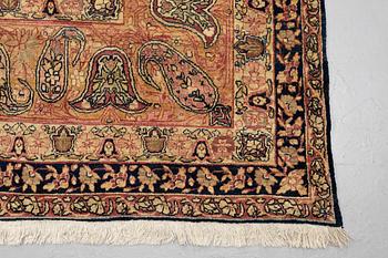 A carpet, semi-antique Kerman Laver, ca 524 x 344 cm.