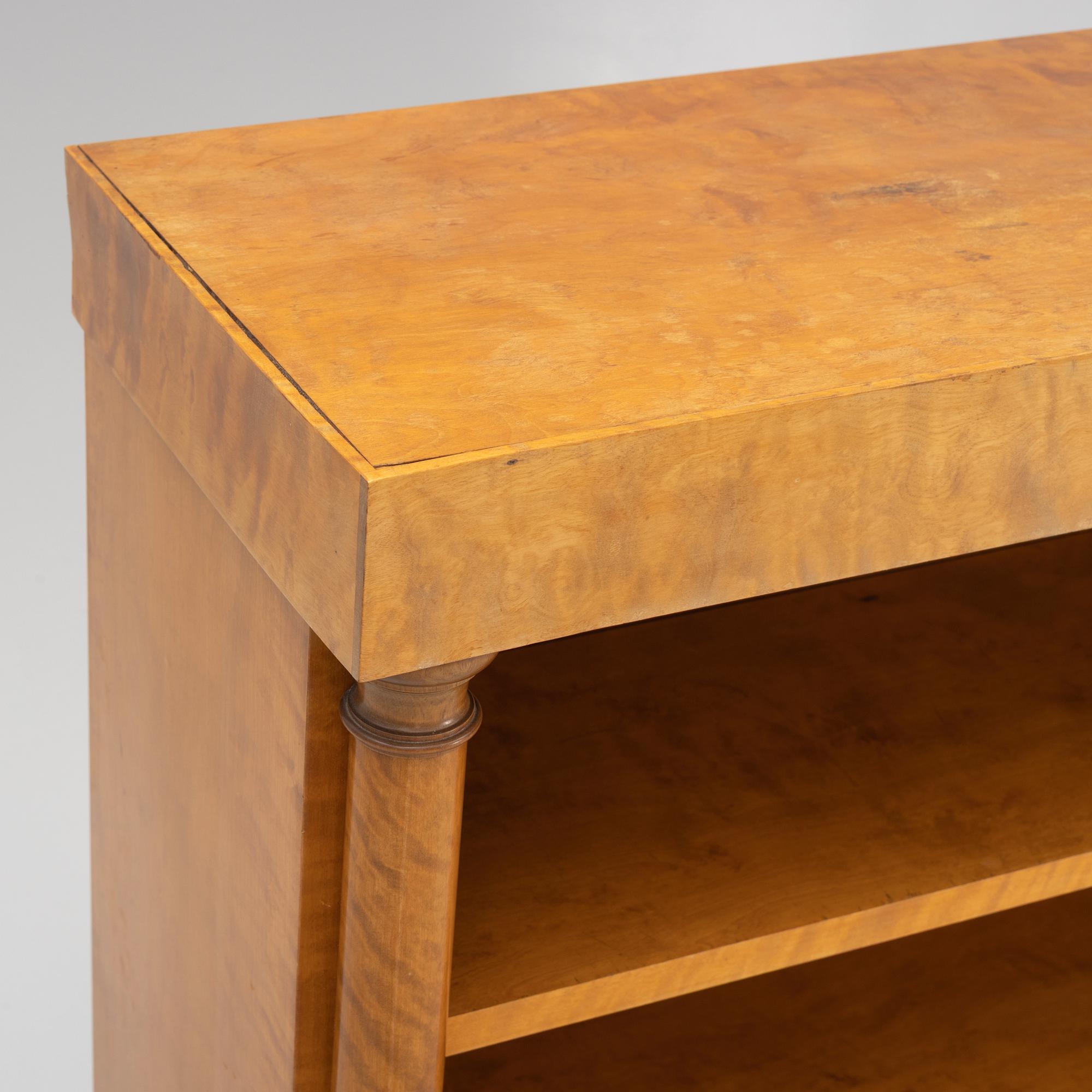 An Empire style bookcase, first half of the 20th century.