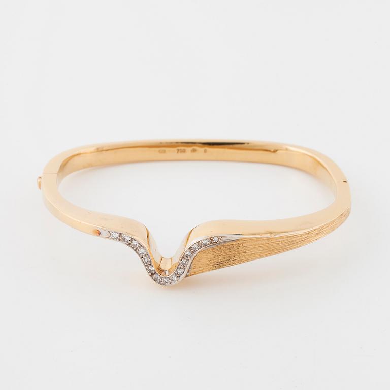 A single cut diamond bangle.