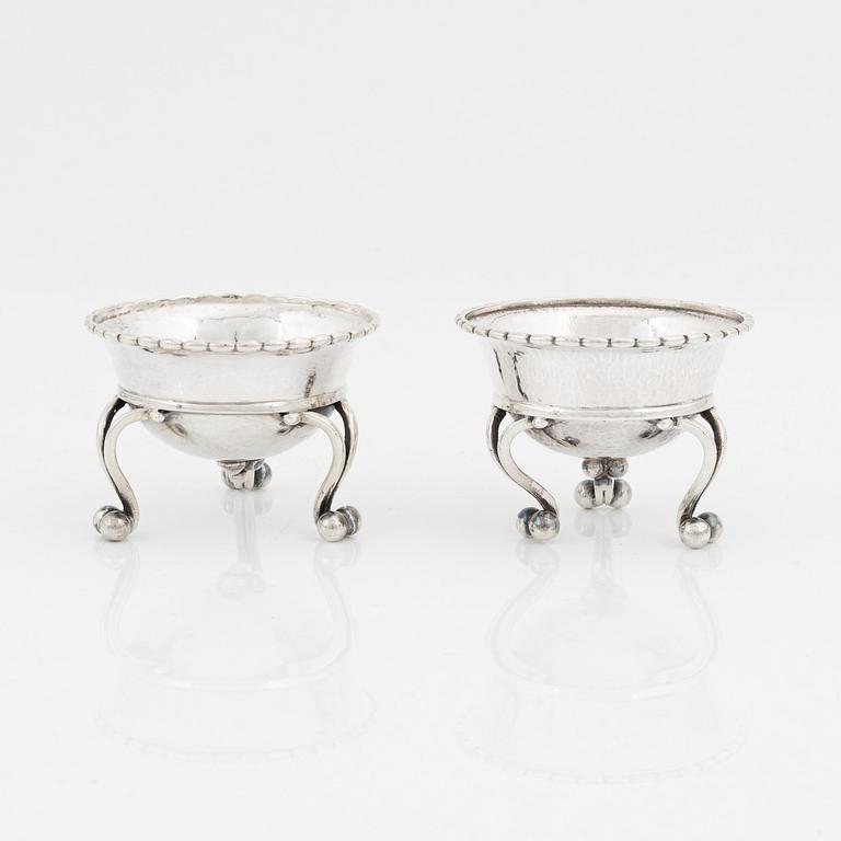 Georg Jensen, two silver salt cellars, model 20, Denmark, 1919- c. 1927.