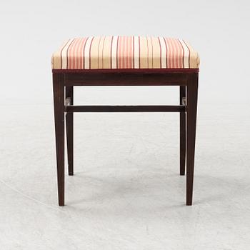A group of five rosewood veneered chairs and a stool, mid 20th Century.