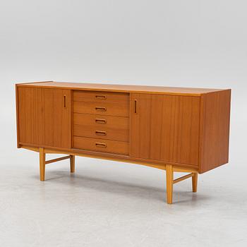 A 1950's/60's teak veneered sideboard.