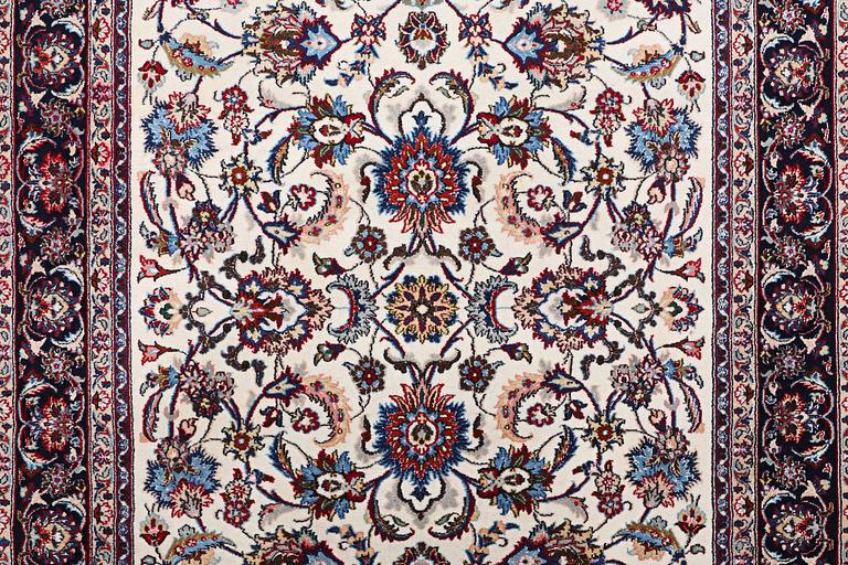 A Nain carpet, part silk, c. 294 x 201 cm.