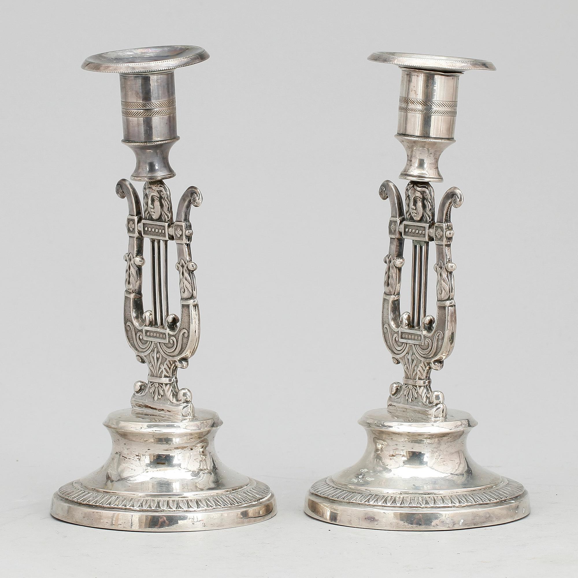LJUSSTAKAR, ett par, silver, Petter Adolf Sjöberg, Stockholm 1828. Empire.