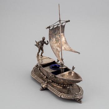 A silver plated inkwell, circa 1900.