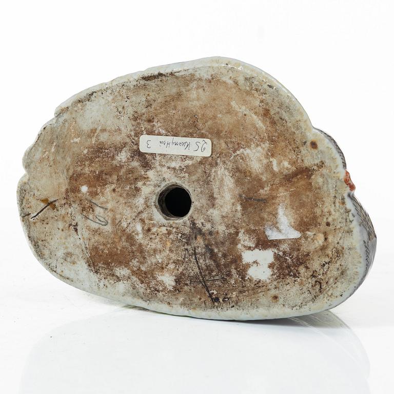 A Chinese famille rose porcelain figure of a Budai, around 1900.