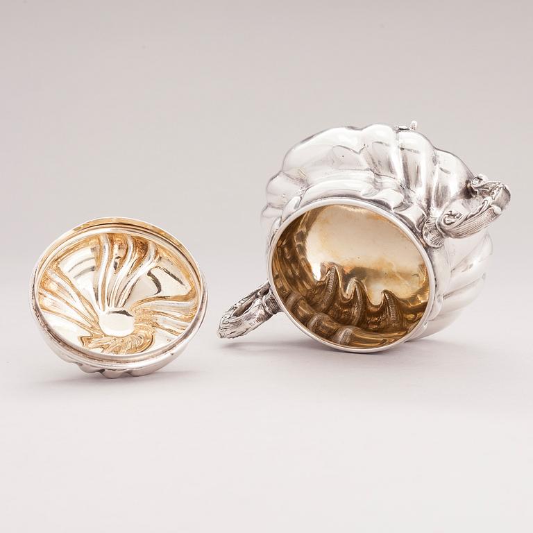 A lidded silver sugar bowl and a set of six silver bowls, Germany.