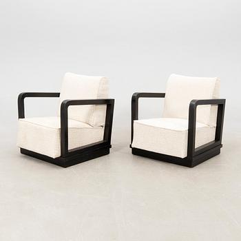 A pair of Art Deco armchairs.