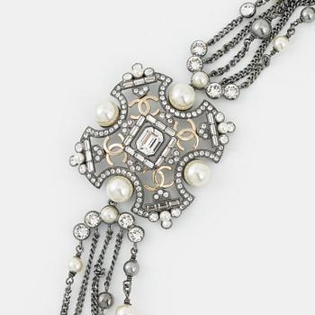 Chanel, a four-layered chain with imitation pearls and strass, 2020.