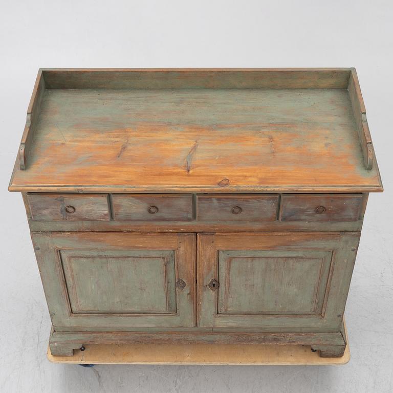 A 19th century sideboard.