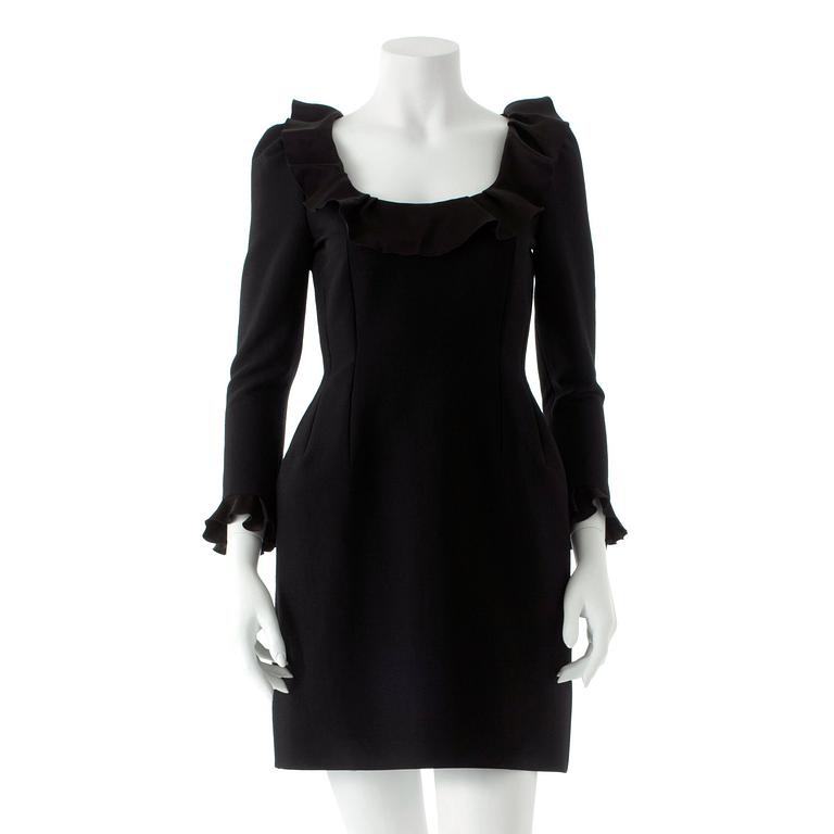 LANVIN, a black wool blend dress with ruffles.