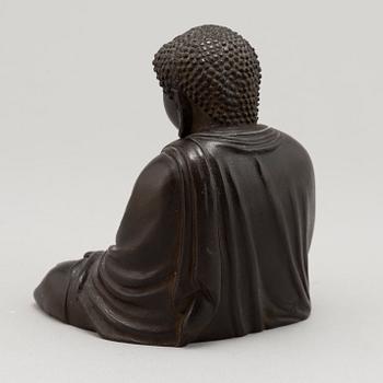 A Japanese seated bronze okimono of Amitabha buddha, 20th century.