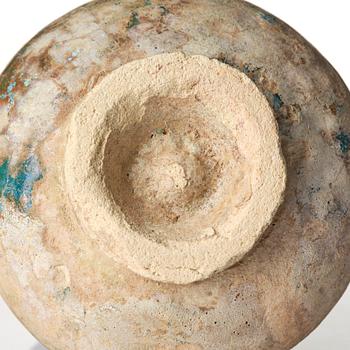 A turquoise-glazed Keshan jug, Persian, 13th century.