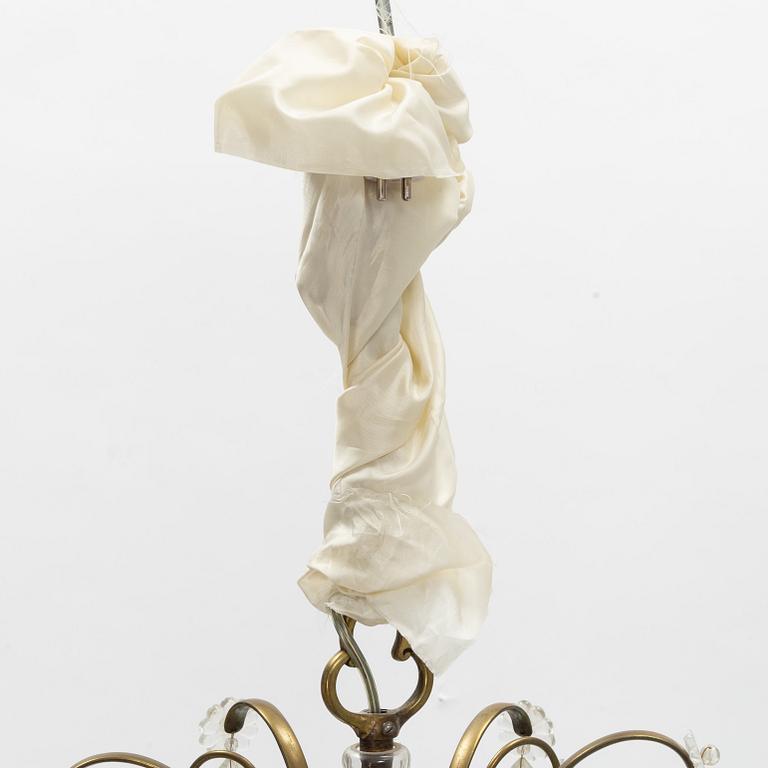 A Rococo style chandelier, mid 20th Century.
