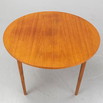 A teak veneered table, second half of the 20th century.