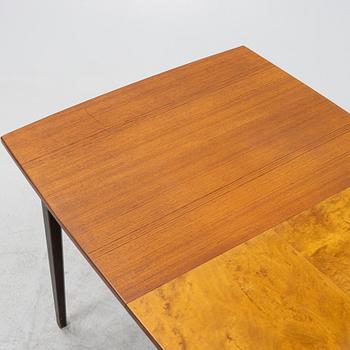 A teak dining table, mid 20th Century.