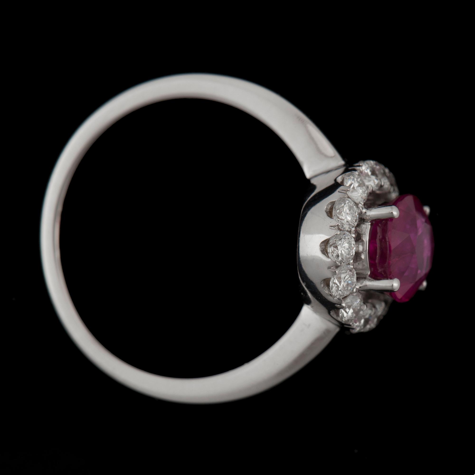 A 1.69 ct ruby and brilliant-cut diamond ring. Total carat weight on diamonds circa 0.51 ct. Quality G-H/VS.