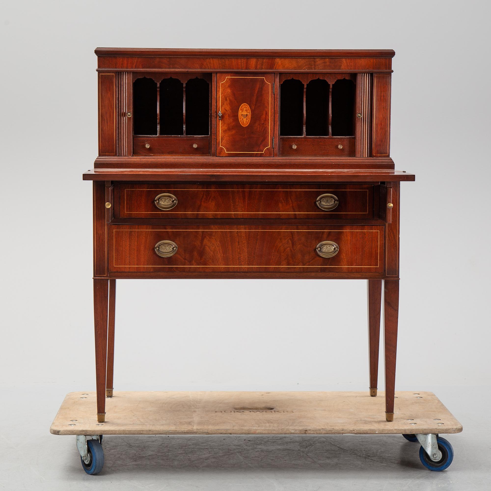 A gustavian style secretaire from the mid 20th century.