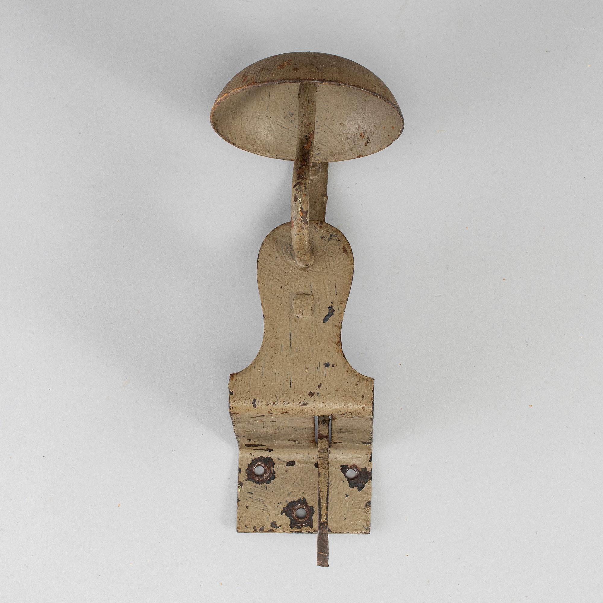 A 19th century iron door bell.