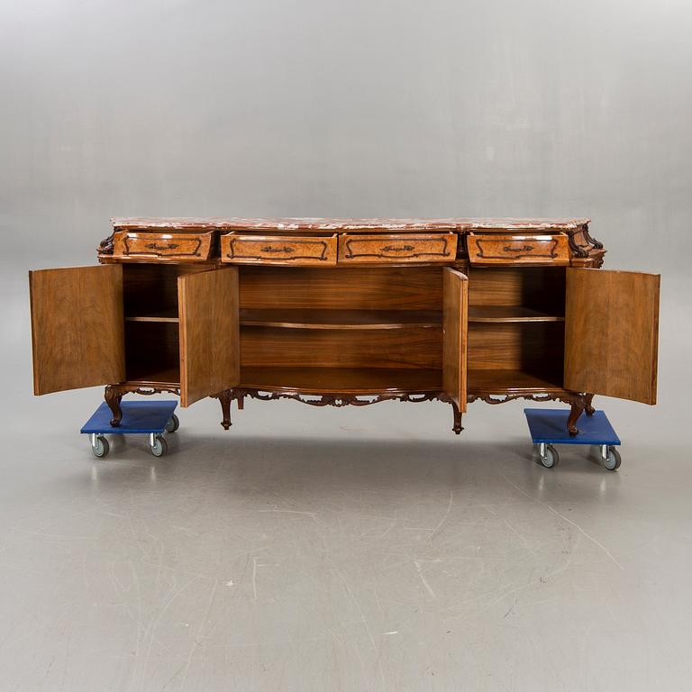 A Louis XV style birch sideboard first half of the 20th century.