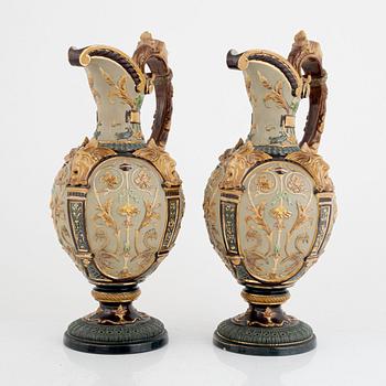 Wilhelm Schiller & Son, a pair of majolica jugs and a jardinier, Austria, early 20th Century.