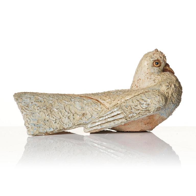 Tyra Lundgren, a chamotte stoneware sculpture of a bird, executed in her studio, Bredkvie, Gotland 1974.