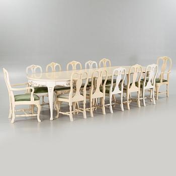 A rococo style table and twelve similar chairs, around the mid 20th century.