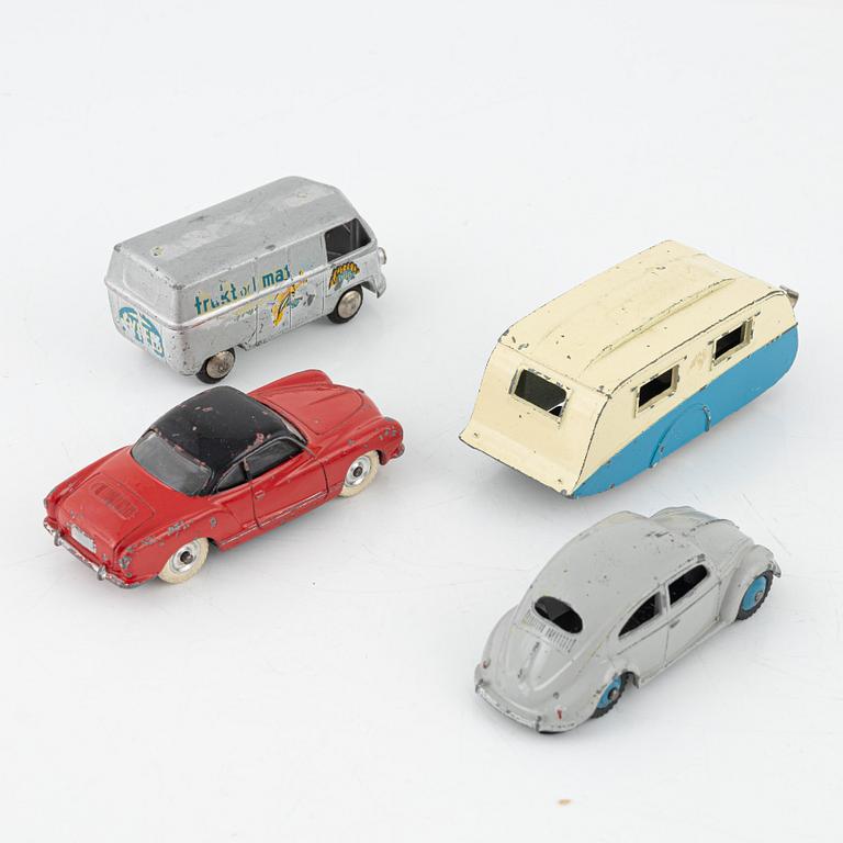 Nine toy cars, mostly Dinky toys.