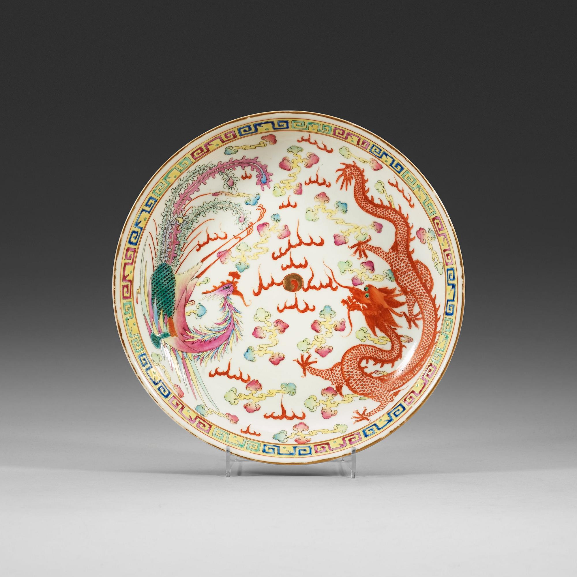 A phenix and dragon famille rose dish, Qing dynasty, with Guangxu six character mark and period (1875-1908).