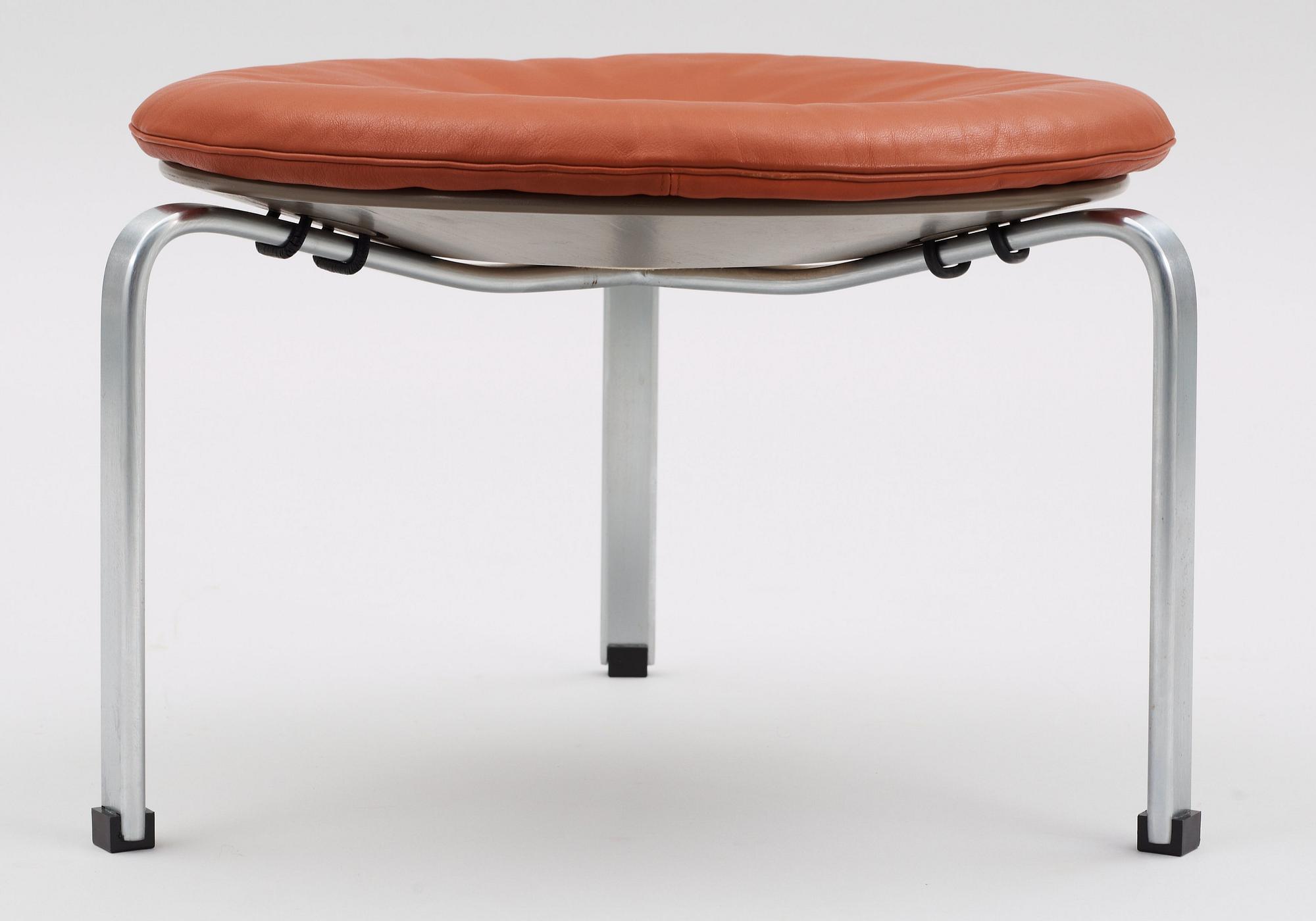 A Poul Kjaerholm brown leather and steel 'PK-33' stool, Fritz Hansen, Denmark 1989.