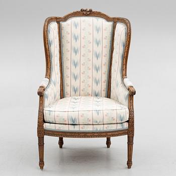 A Louis XVI-style bergere, late 19th century.